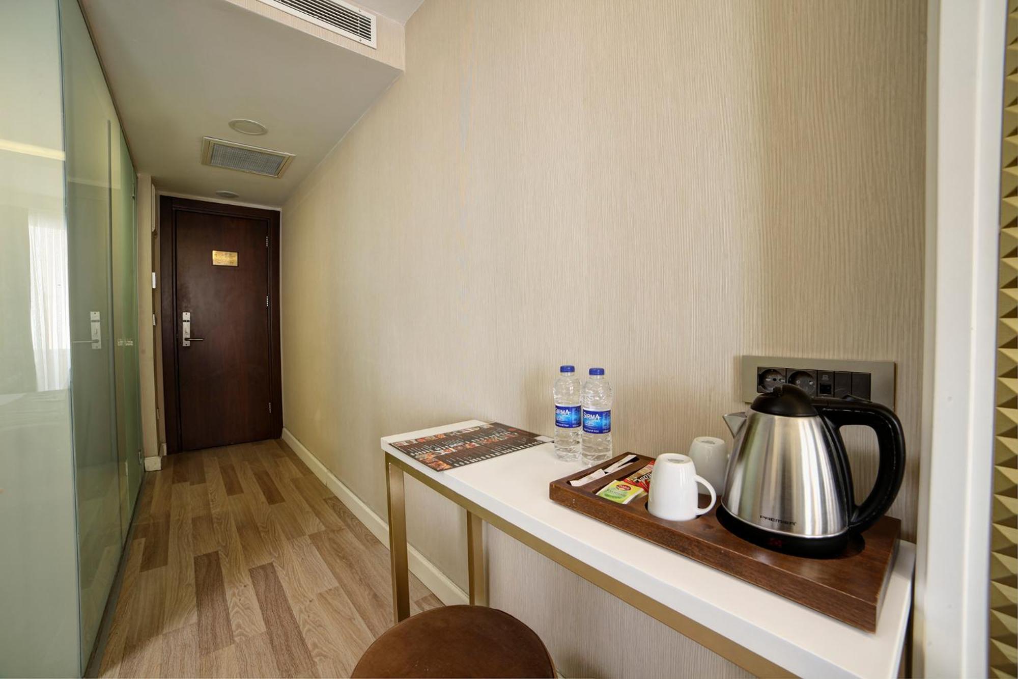Great Fortune Hotel & Spa Istanbul Exterior photo A tea and coffee making facility in a hotel room
